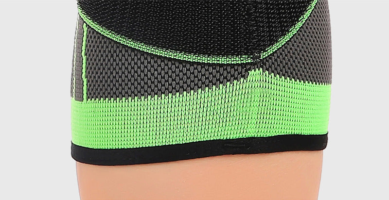Détail du tissu extensible de la genouillère verte