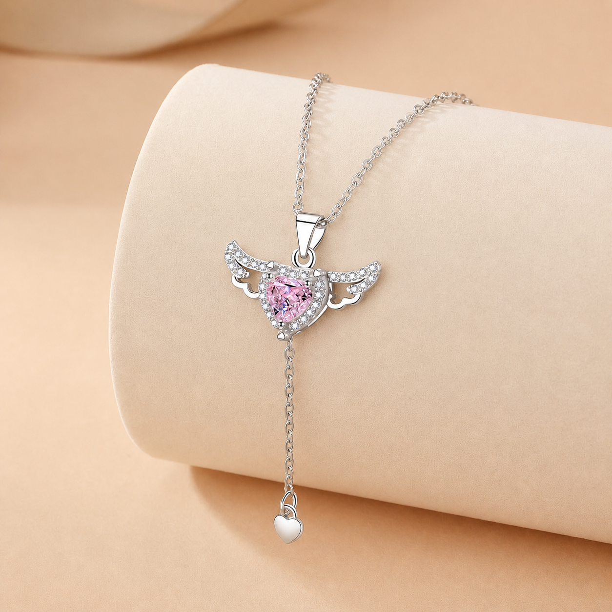 Collier Cœur Ailé argenté avec cristal rose