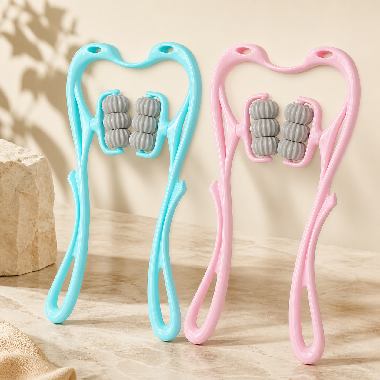 Masseurs cervicaux manuels bleu et rose
