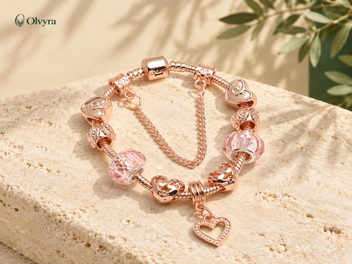 Bracelet à breloques or rose — 4 motifs Olvyra — Cœur.