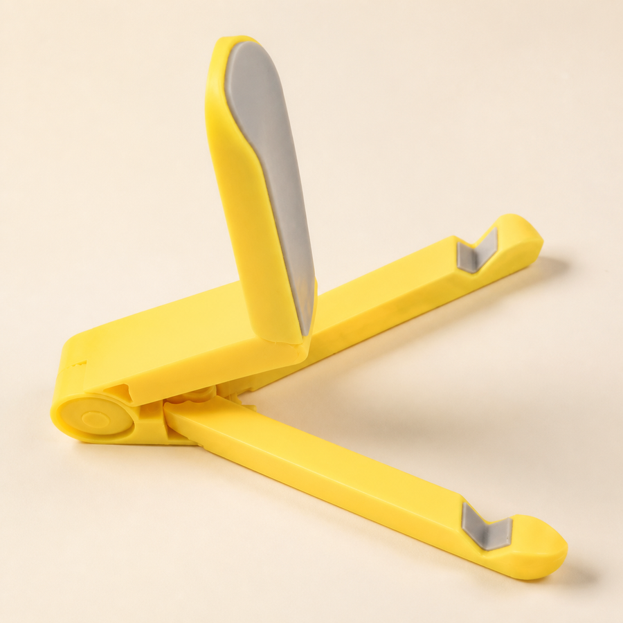 Support pliable jaune pour téléphone et tablette — Yellow foldable phone and tablet stand