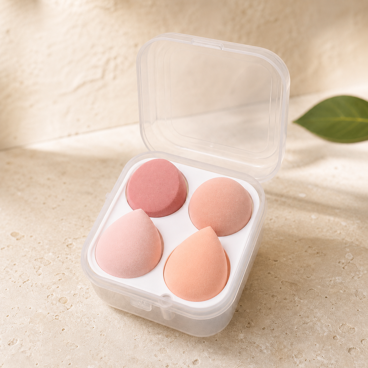 Coffret de quatre éponges pêche — Peach four-piece makeup sponge case