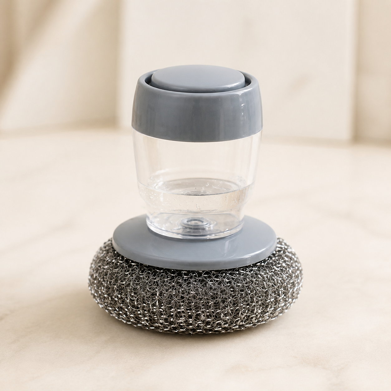 Brosse-distributeur avec tampon métallique — Soap dispenser with metal scourer