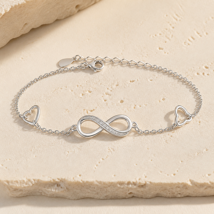 Bracelet infini ajustable en argent 925 — Infini avec deux grands cœurs ajourés